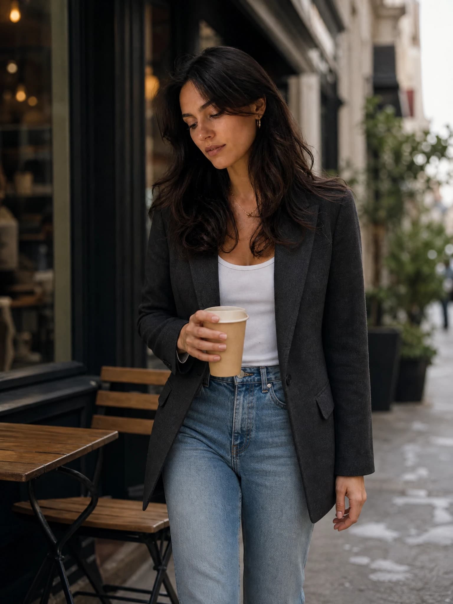 Fictional adult creator working from a coffee shop