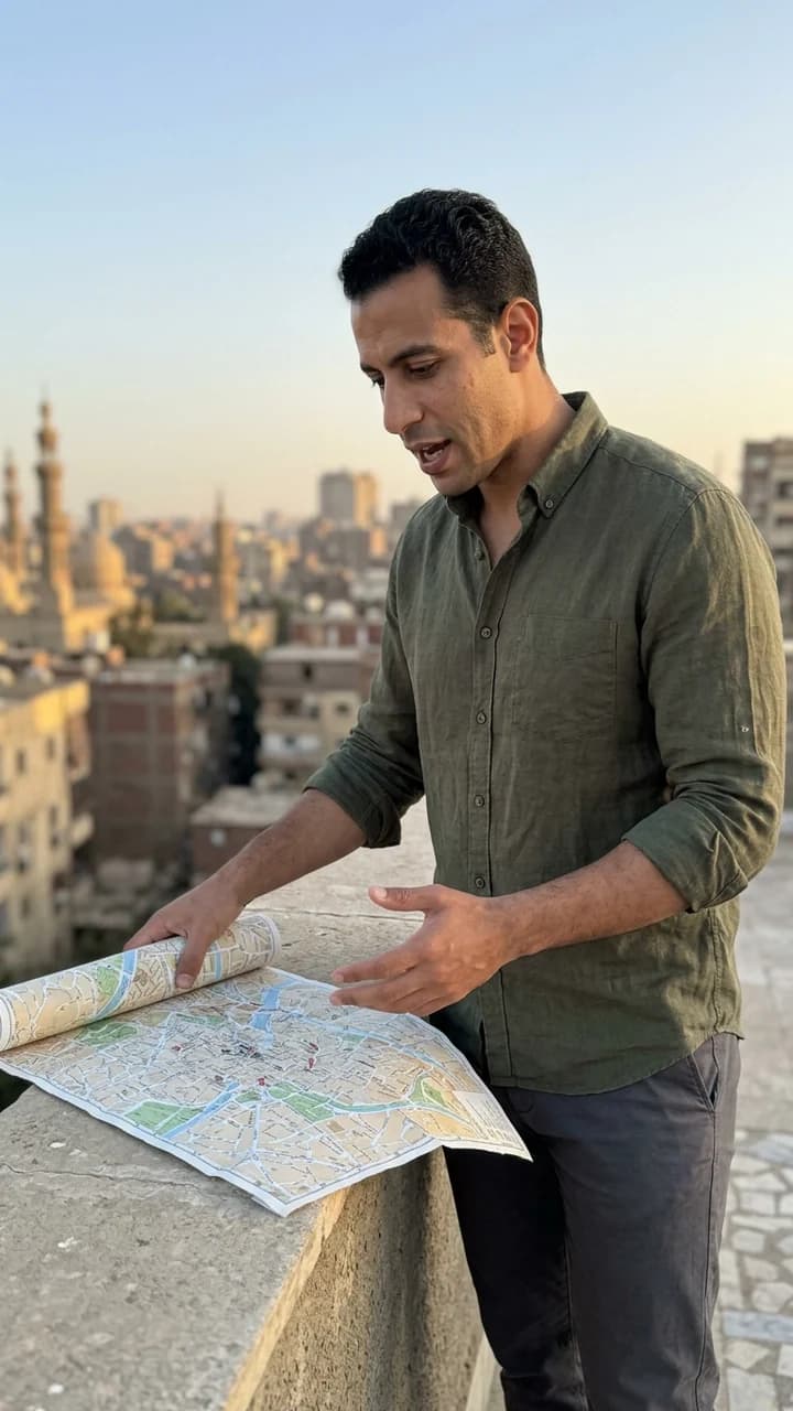Omar El-Sayed, a fictional adult human storytelling creator, unrolling a city map on a rooftop while recounting a travel story