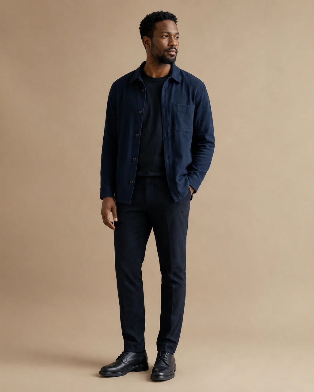 Fictional adult source photo wearing a navy overshirt