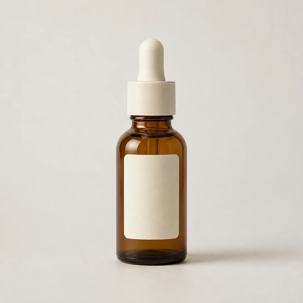 Fictional unbranded amber serum bottle on a plain light background