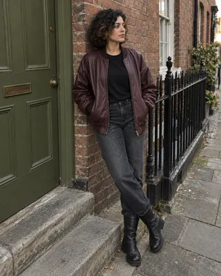 Street Style Photoshoot: Wider full-length frame with hands in jacket pockets